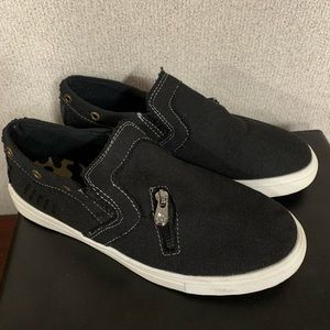 Black stylish distressed canvas loafers.